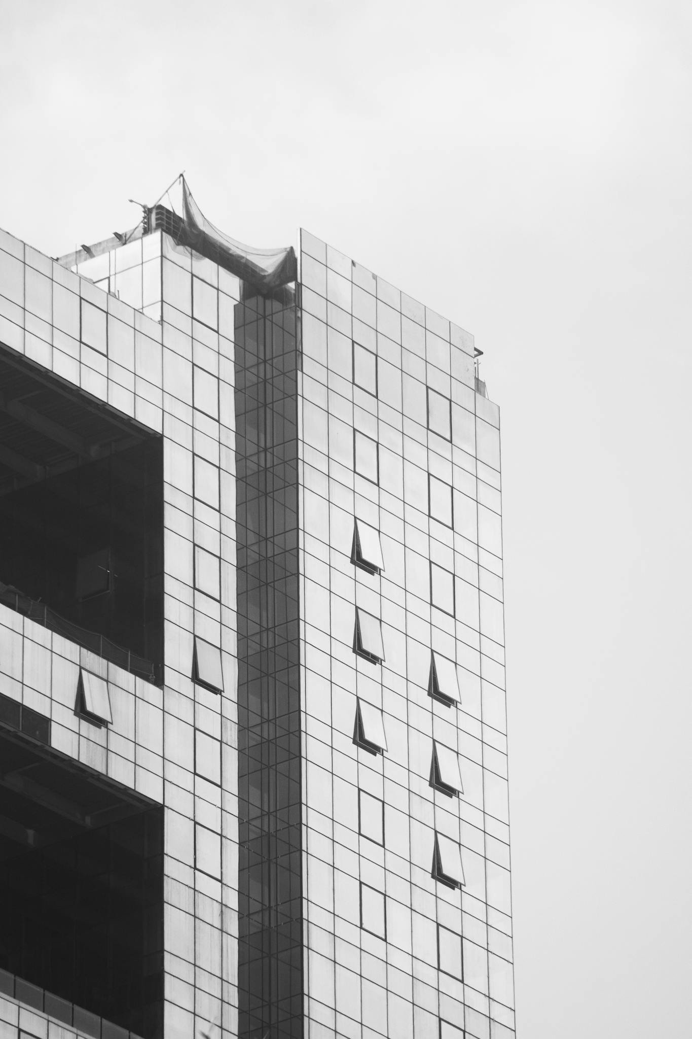 Black and white photo of a building with a window